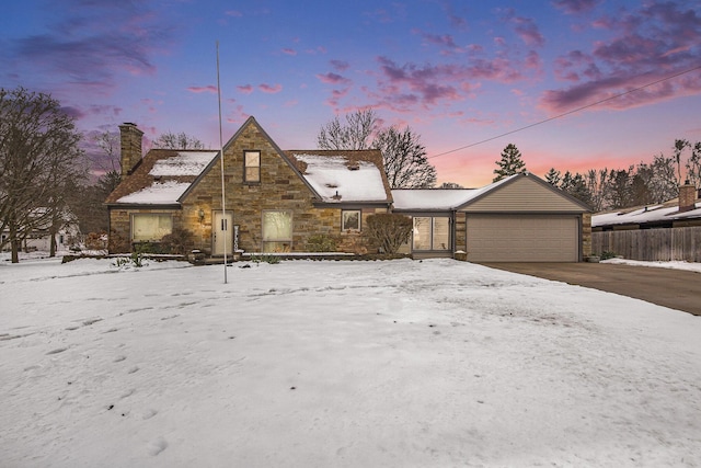 view of front of property with a garage