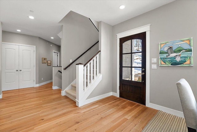 foyer entrance featuring light wood-type flooring