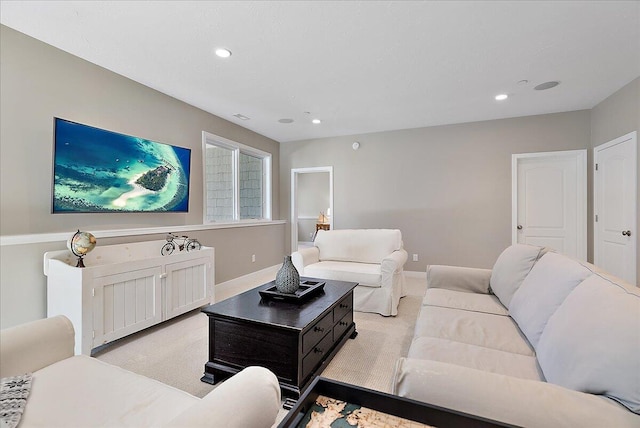 living room featuring light colored carpet