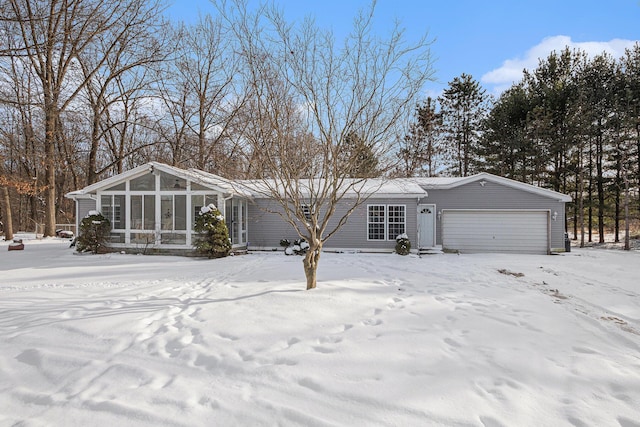 single story home featuring a garage