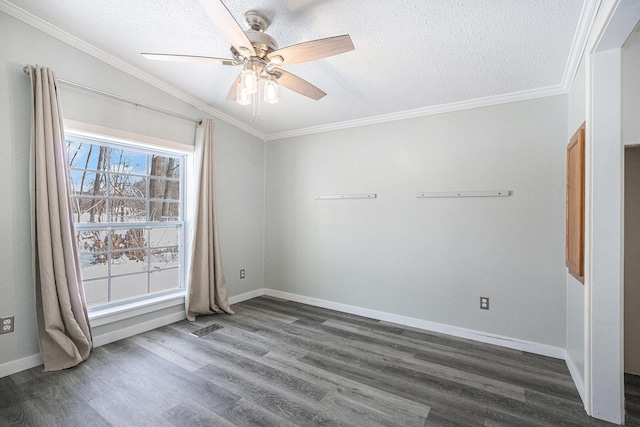 spare room with crown molding, dark hardwood / wood-style floors, and a textured ceiling