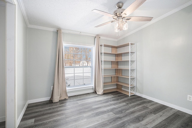 unfurnished room featuring ceiling fan, ornamental molding, hardwood / wood-style floors, and a textured ceiling