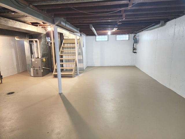 basement featuring heating unit