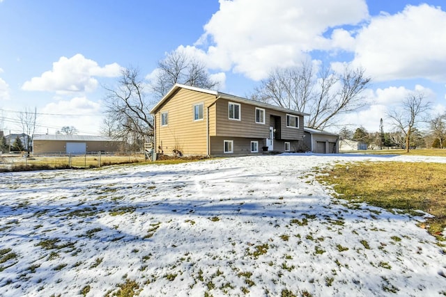 view of snow covered house