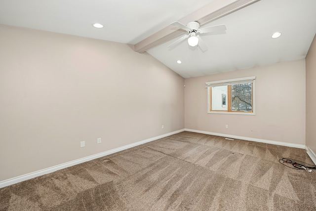 empty room with vaulted ceiling with beams, carpet floors, and ceiling fan