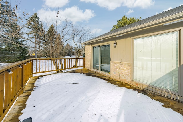 view of snow covered deck