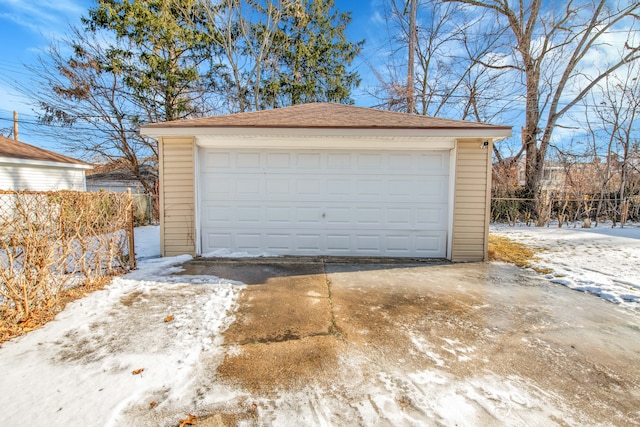 view of snow covered garage