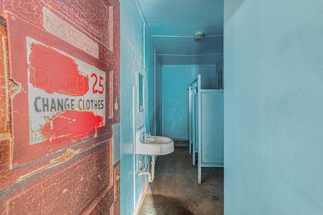 bathroom with concrete flooring