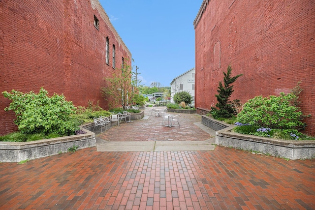 surrounding community with a patio