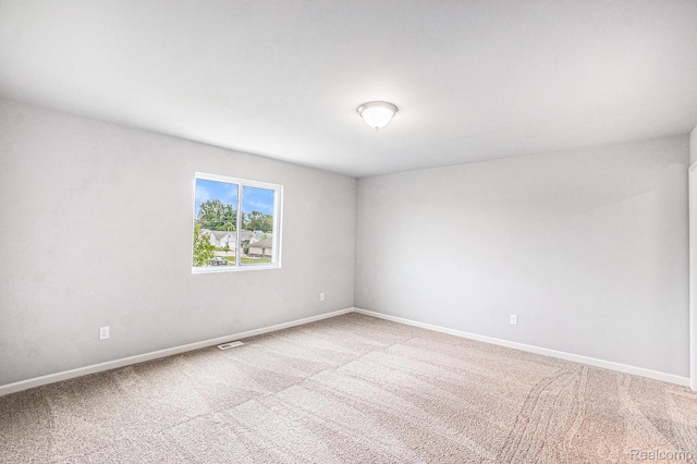 730 Natalia Dr, Davison, MI 48423 - carpeted empty room featuring baseboards