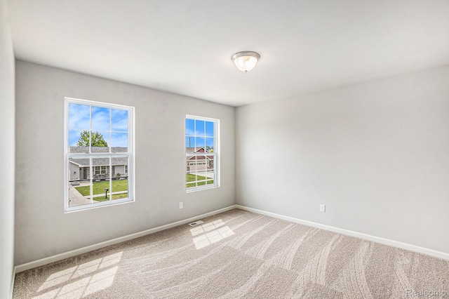 730 Natalia Dr, Davison, MI 48423 - carpeted spare room featuring baseboards