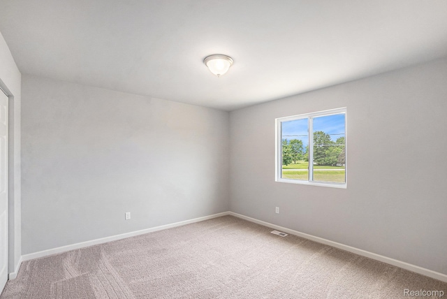 730 Natalia Dr, Davison, MI 48423 - spare room featuring light colored carpet