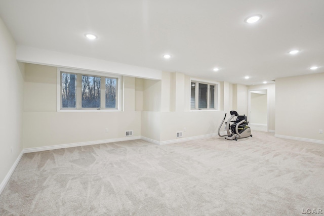 basement with light colored carpet