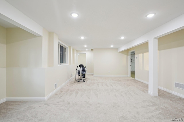 basement with light carpet