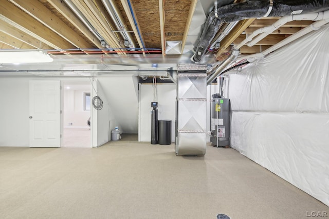 basement featuring gas water heater