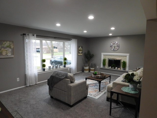 carpeted living room featuring a brick fireplace