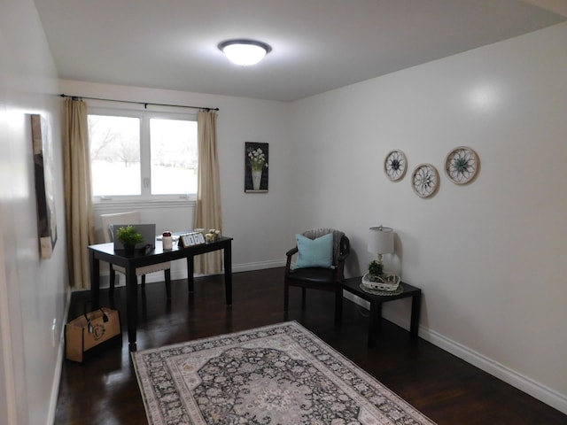 sitting room with dark hardwood / wood-style floors