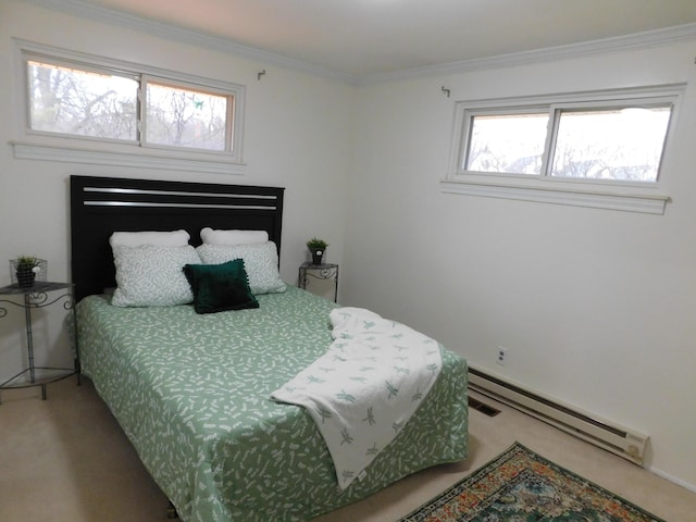 carpeted bedroom featuring crown molding and baseboard heating