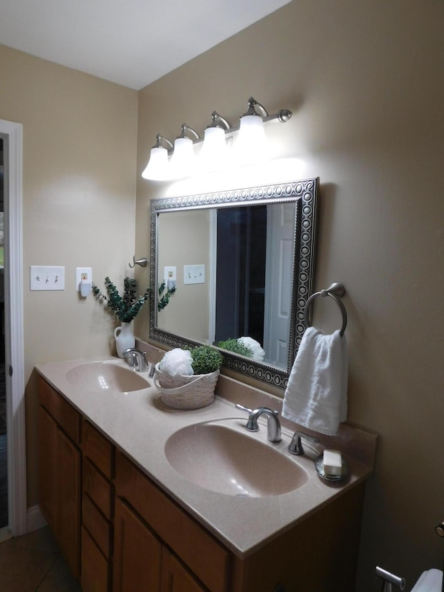 bathroom with vanity and tile patterned flooring