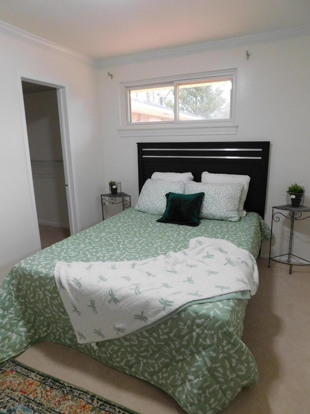 bedroom with ornamental molding