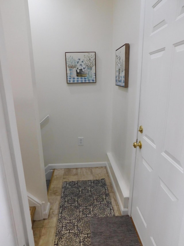 interior space with light tile patterned floors