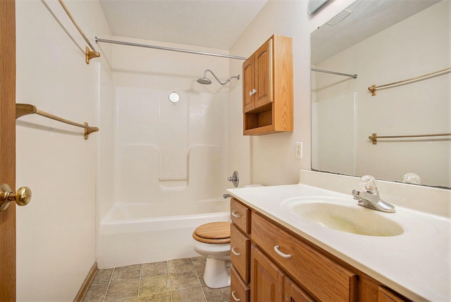 full bathroom with bathtub / shower combination, vanity, and toilet