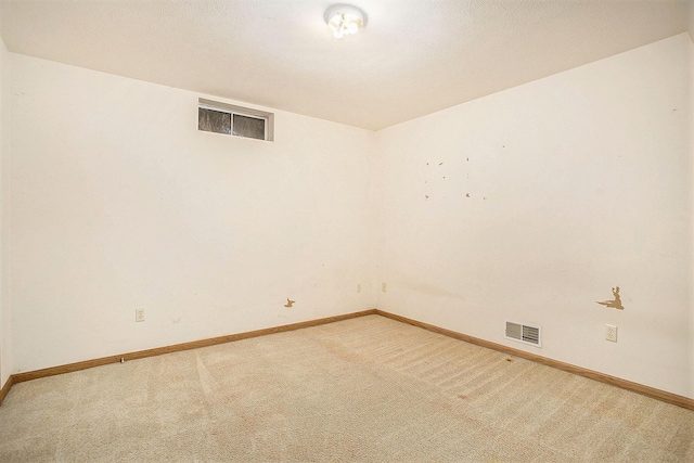 empty room featuring carpet