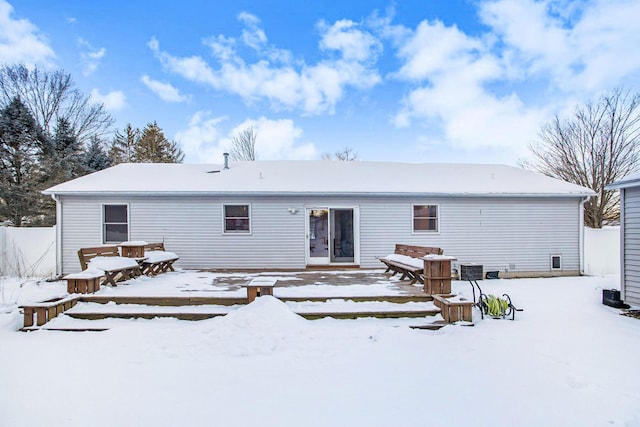 view of snow covered house