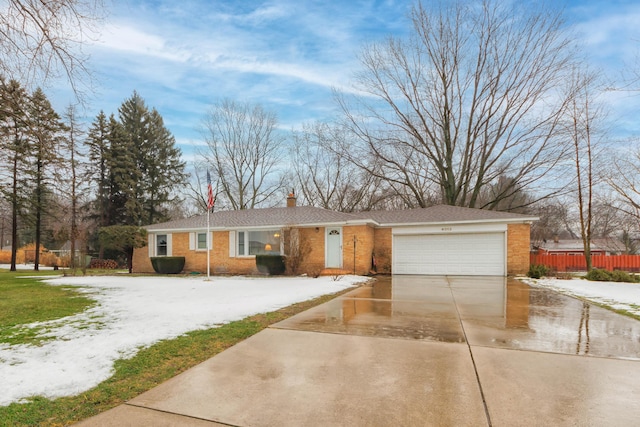 single story home with a garage