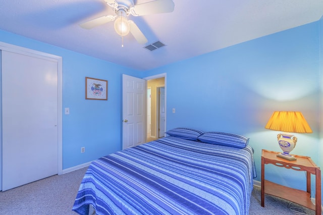 carpeted bedroom featuring ceiling fan