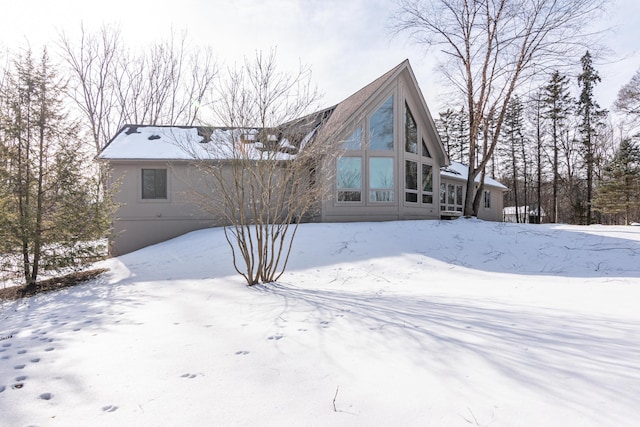 view of snow covered property