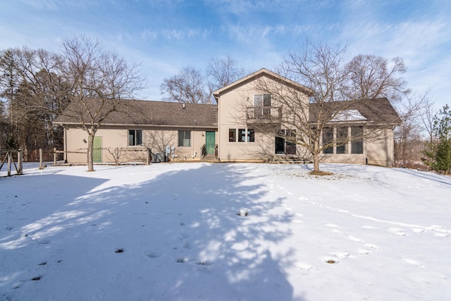 view of snow covered property