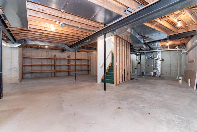 basement with heating unit and gas water heater