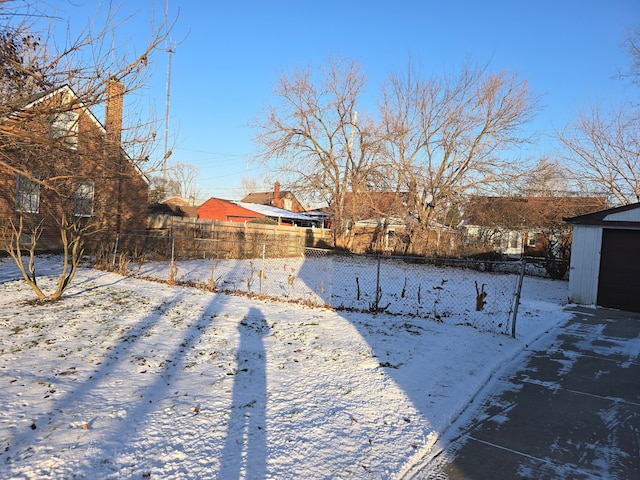 view of yard covered in snow