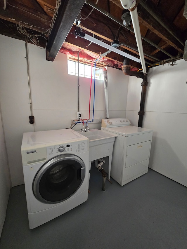 laundry room featuring separate washer and dryer