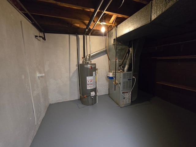 basement with water heater and heating unit