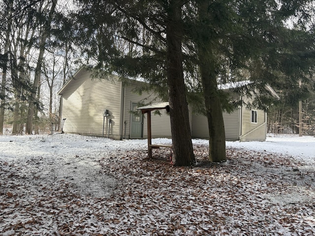 view of snow covered property