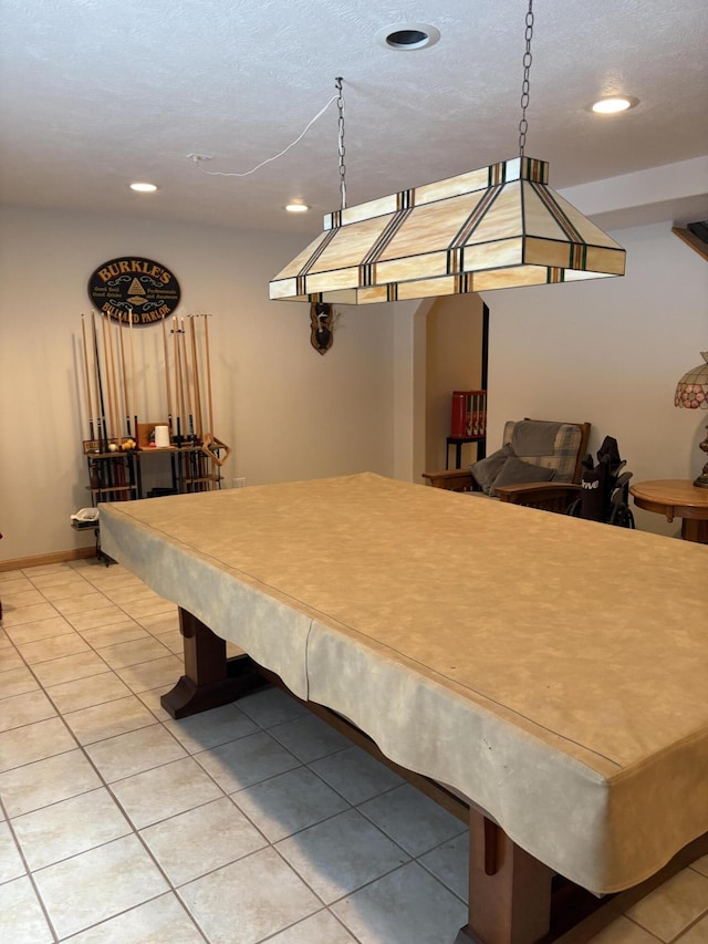 game room with tile patterned flooring