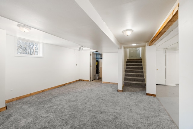 basement featuring light colored carpet