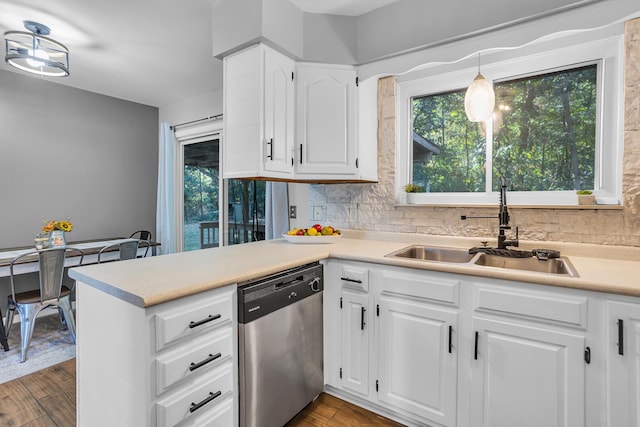 kitchen with decorative light fixtures, white cabinetry, dishwasher, wood-type flooring, and sink