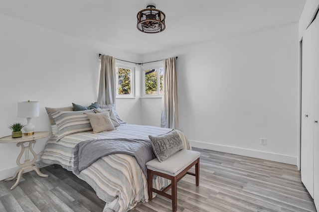 bedroom with light wood-type flooring