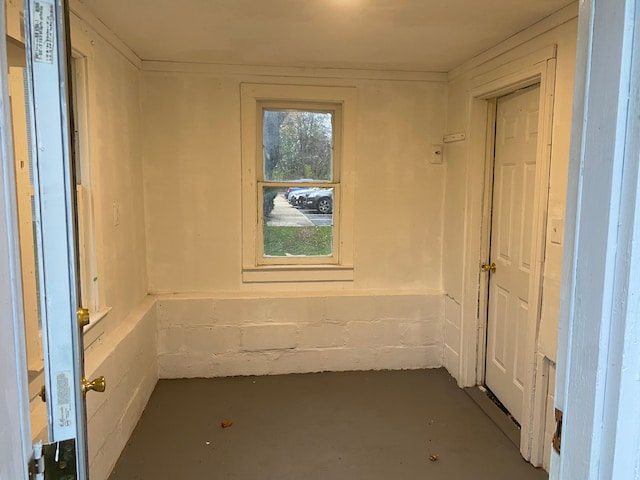 1192 S Belsay Rd, Burton, MI 48509 - spare room with concrete floors