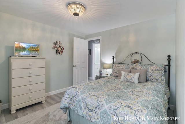 bedroom featuring light wood-type flooring