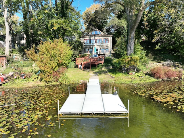 dock area with a water view