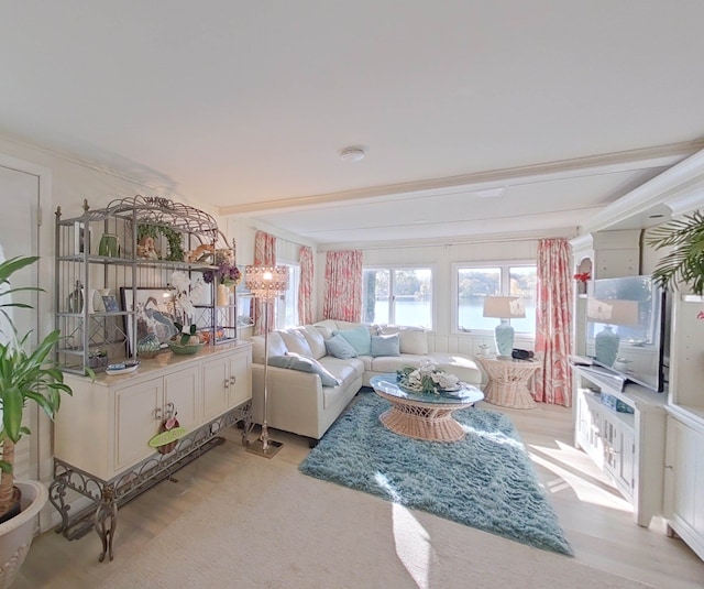 living room featuring beamed ceiling