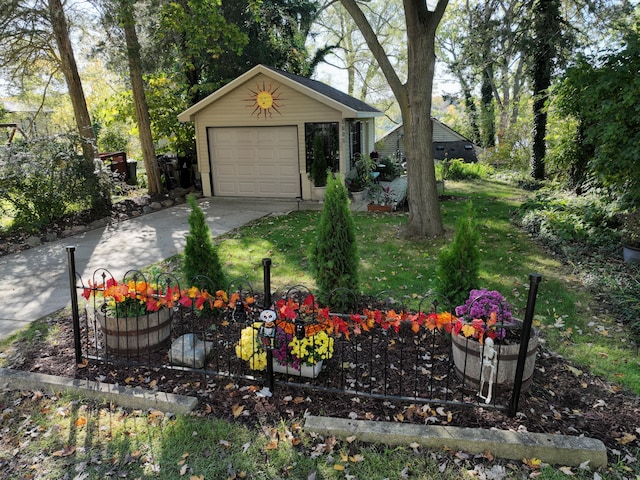 view of yard with a garage and an outdoor structure