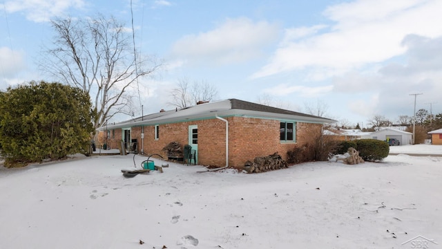 view of snow covered property