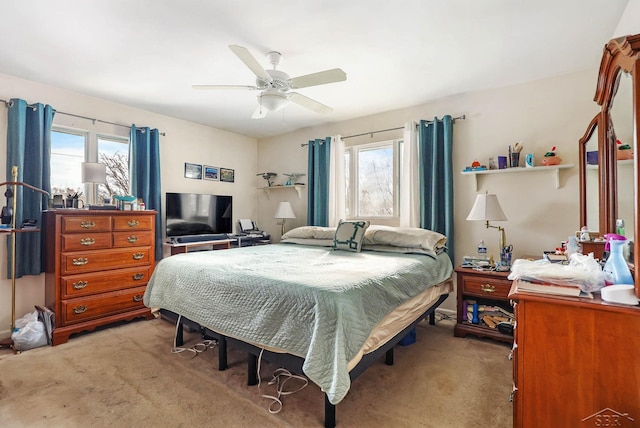 bedroom featuring ceiling fan and carpet floors