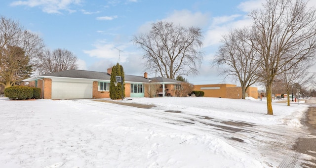 single story home with a garage