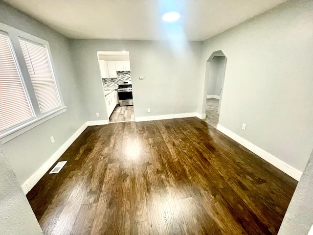 unfurnished living room with hardwood / wood-style floors